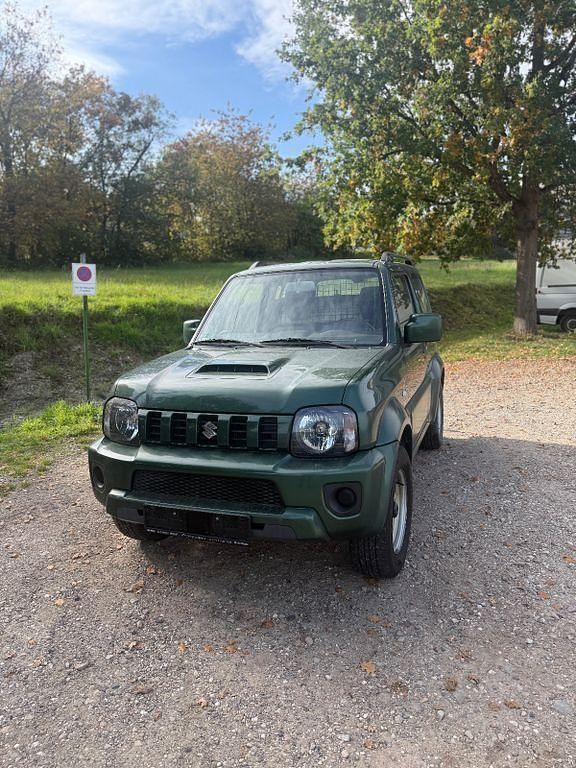 Grün Gebraucht 2012 Suzuki Jimny SUV | 7.900 € (Guter Preis) - Bild 1/4
