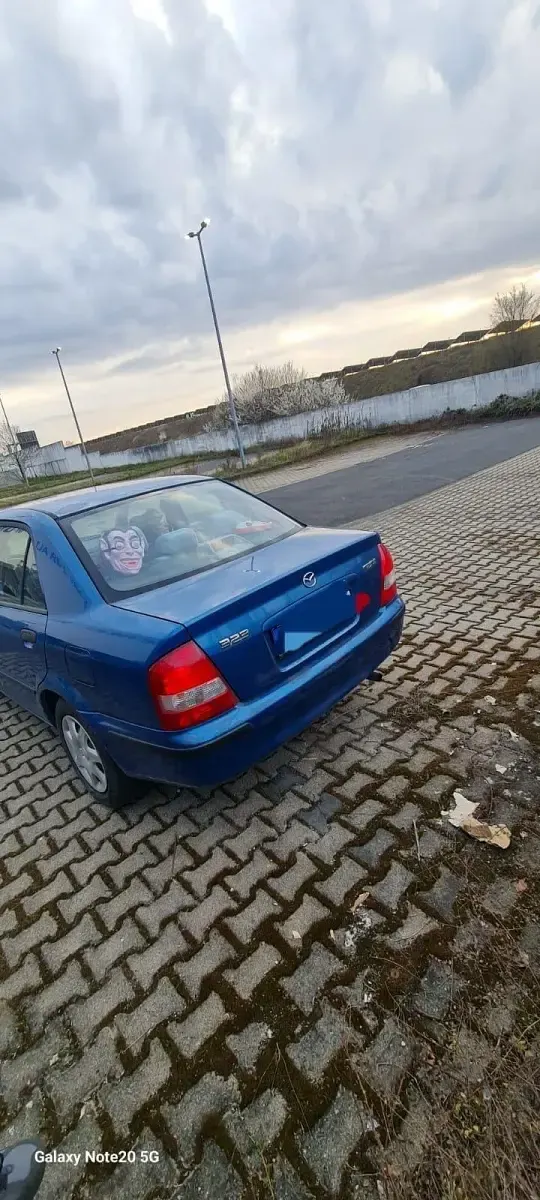 Gebraucht Mazda 323 90 PS (66 kW) 1998 Blau Kleinwagen