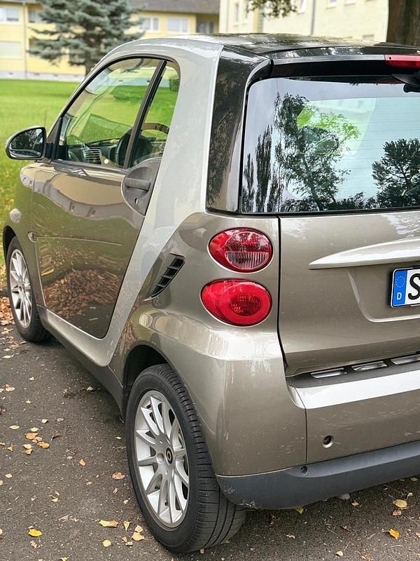 Gold Gebraucht 2009 Smart ForTwo Coupé Kleinwagen | 3.499 € (Fairer Preis) - Bild 1/4
