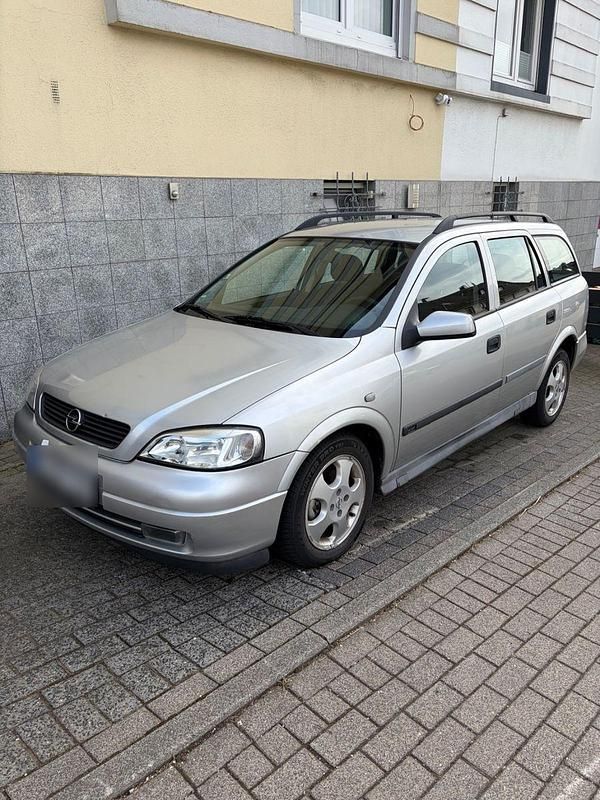 Second-hand Opel Astra 101 CP (74 kW) 2000 Argintiu Break