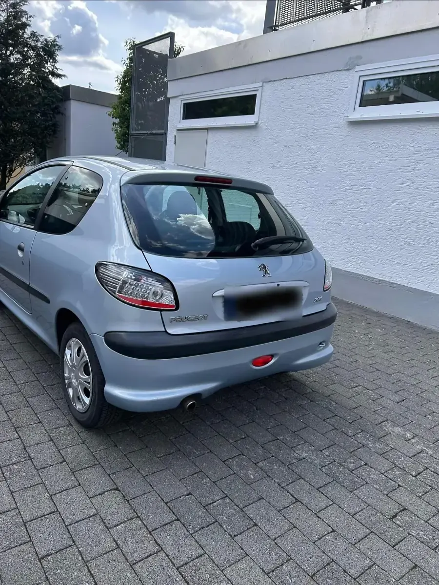 Gebraucht Peugeot 206 60 PS (44 kW) 2004 Silber Kleinwagen