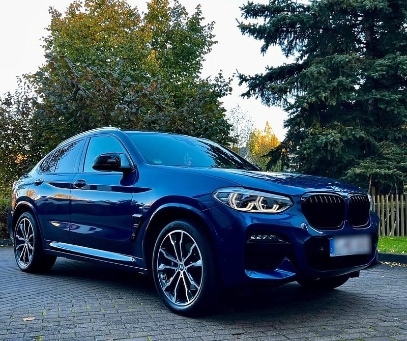 Blau Gebraucht 2020 BMW X4 Sport Line SUV | 42.900 € - Bild 1/4