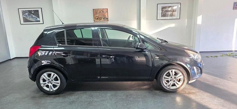 Schwarz Gebraucht 2013 Opel Corsa Active Kleinwagen | 5.990 € (Fairer Preis) - Bild 1/4
