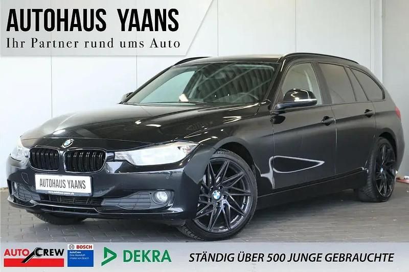 Black sapphire metallic Gebraucht 2013 BMW 316 Comfort Edition Kombi | 12.499 € (Teuer) - Bild 1/4
