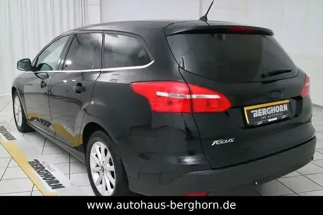 Gebraucht Ford Focus Titanium 125 PS (91 kW) 2017 Iridium schwarz (metallic) Kombi