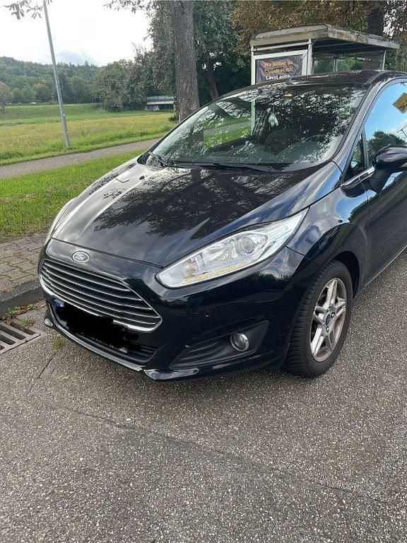 Schwarz Gebraucht 2014 Ford Fiesta Titanium Kleinwagen | 8.999 € (Fairer Preis) - Bild 1/4
