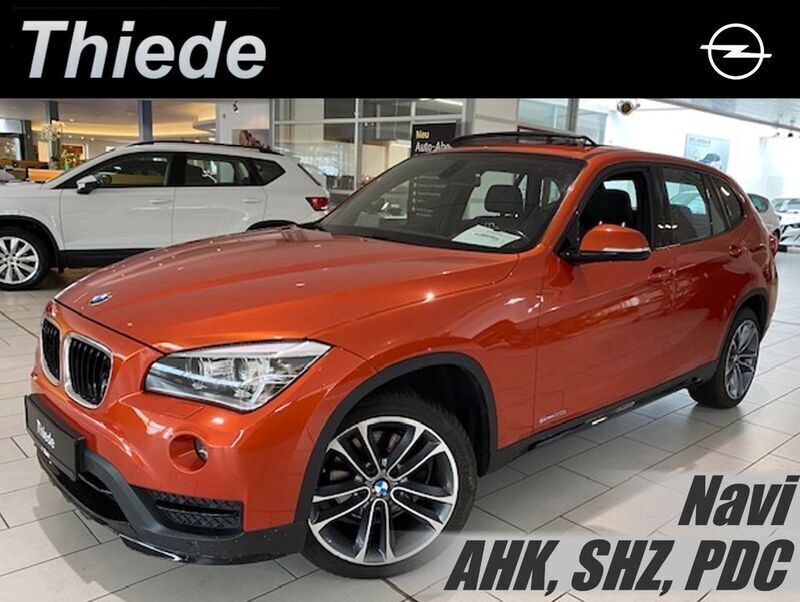 Gebraucht BMW X1 Shadowline 184 PS (135 kW) 2014 Valencia orange metallic SUV