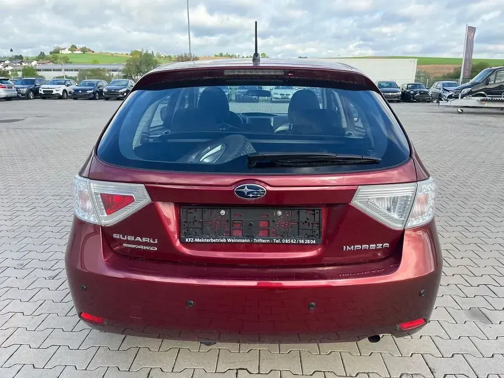 Gebraucht Subaru Impreza Active 107 PS (78 kW) 2011 Rot Limousine