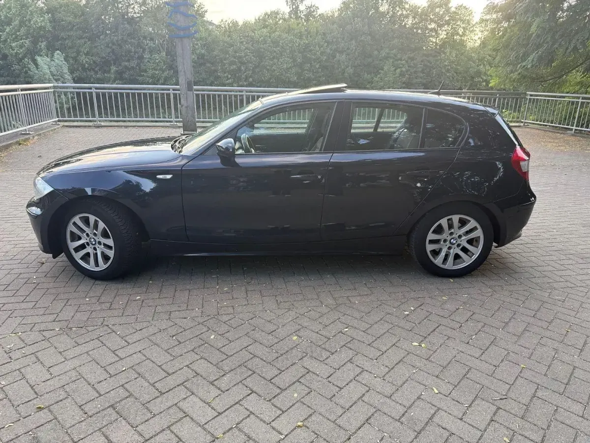 Gebraucht BMW 116 116 PS (85 kW) 2006 Schwarz Kleinwagen
