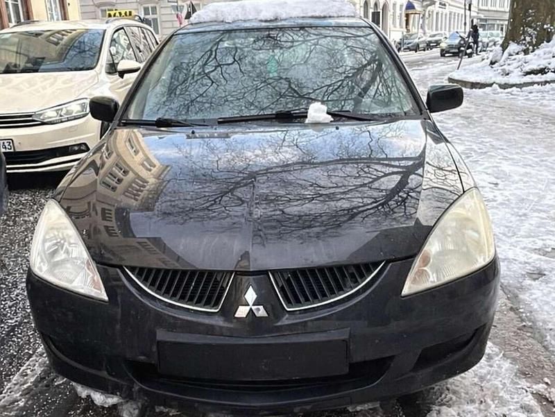 Schwarz Gebraucht 2005 Mitsubishi Lancer Limousine | 2.500 € (Fairer Preis) - Bild 1/2