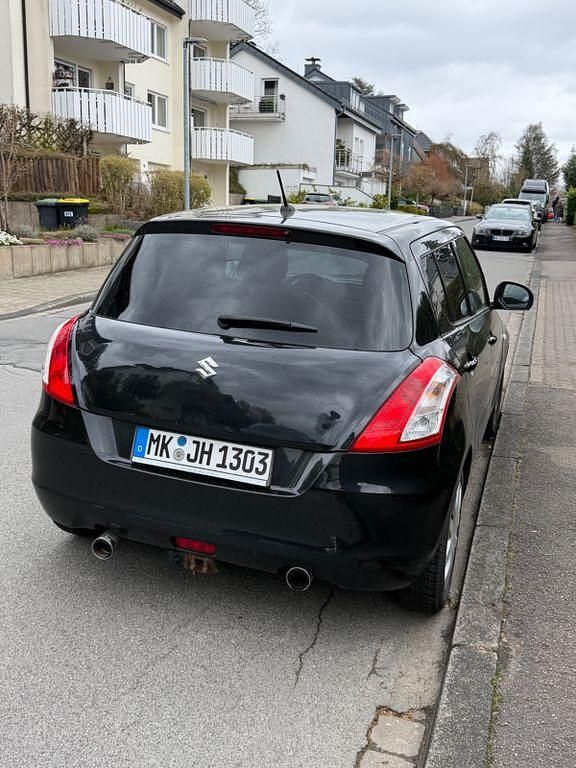 Second-hand Suzuki Swift 94 CP (69 kW) 2012 Negru Hatchback