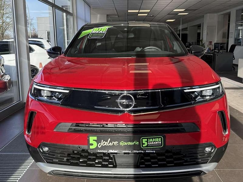 Gebraucht Opel Mokka-e Ultimate 100 kW (136 PS) 2023 Power rot/kosmos rot SUV