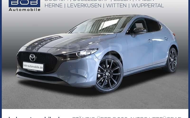 Grau Gebraucht 2023 Mazda 3 Homura-Line Limousine | 24.670 € (Fairer Preis) - Bild 1/4