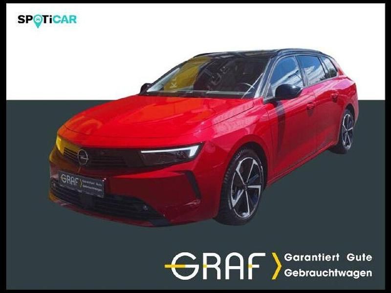 Peperoncino/schwarz Gebraucht 2024 Opel Astra Elegance Kombi | 28.980 € (Fairer Preis) - Bild 1/4