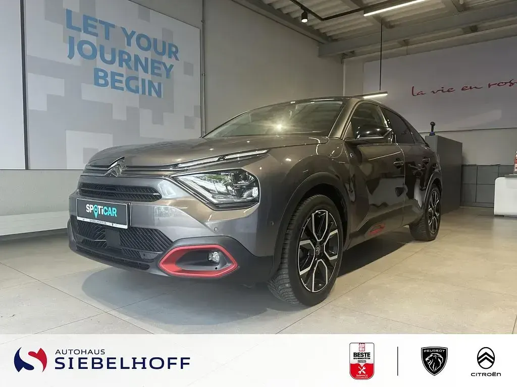Gebraucht Citroën e-C4 Shine 100 kW (136 PS) 2022 Platinium grau Limousine