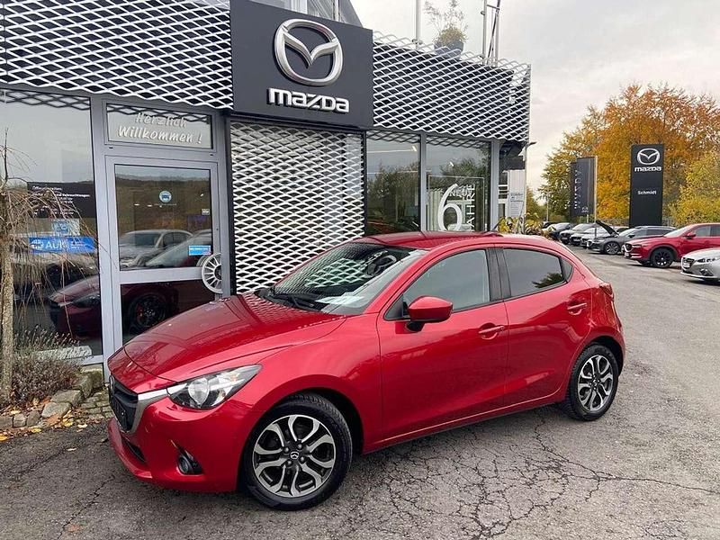 Rubinrot metallic Gebraucht 2017 Mazda 2 Nakama Kleinwagen | 11.990 € (Fairer Preis) - Bild 1/4