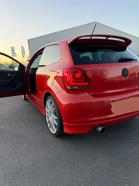 Gebraucht VW Polo Team 105 PS (77 kW) 2010 Orange Kleinwagen