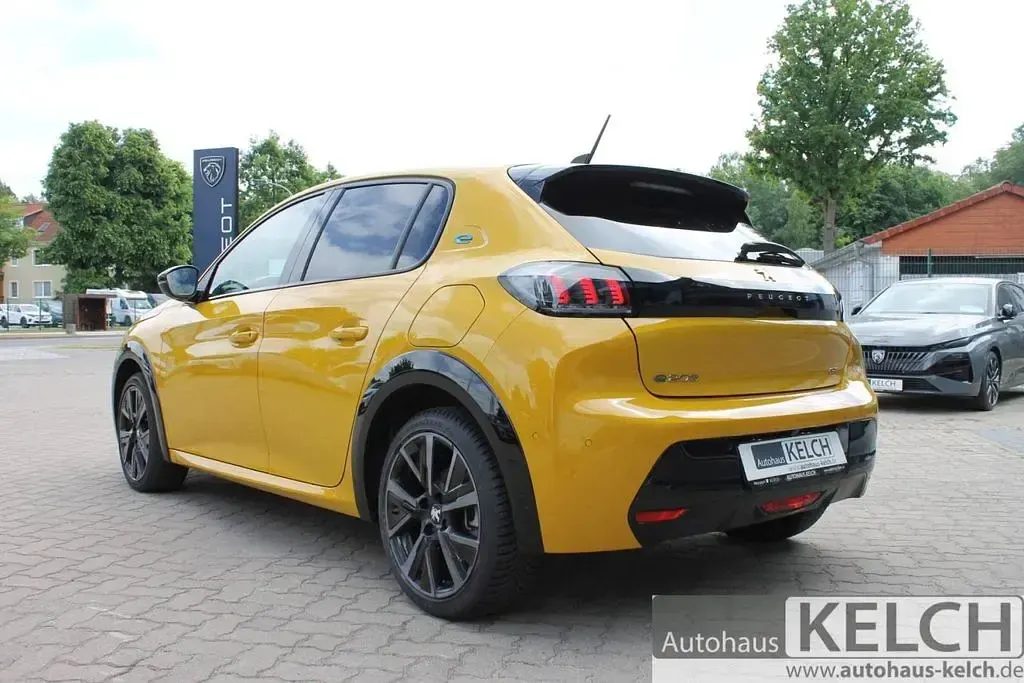Gebraucht Peugeot e-208 GT 100 kW (136 PS) 2023 Faro gelb (metallic) Kleinwagen