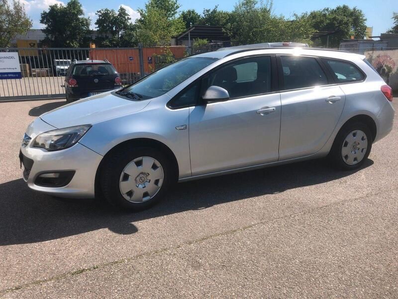 Silber Gebraucht 2015 Opel Astra Kombi | 2.299 € (Fairer Preis) - Bild 1/4