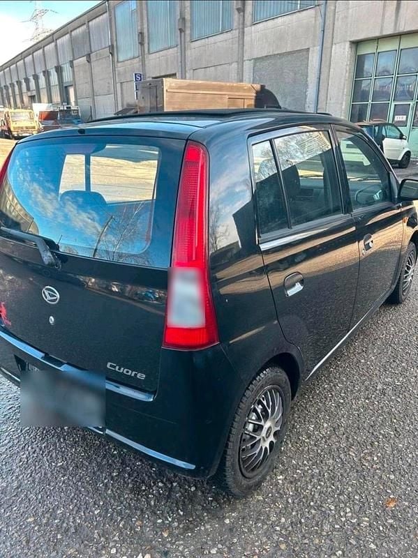 Gebraucht Daihatsu Cuore 58 PS (42 kW) 2004 Schwarz Kleinwagen