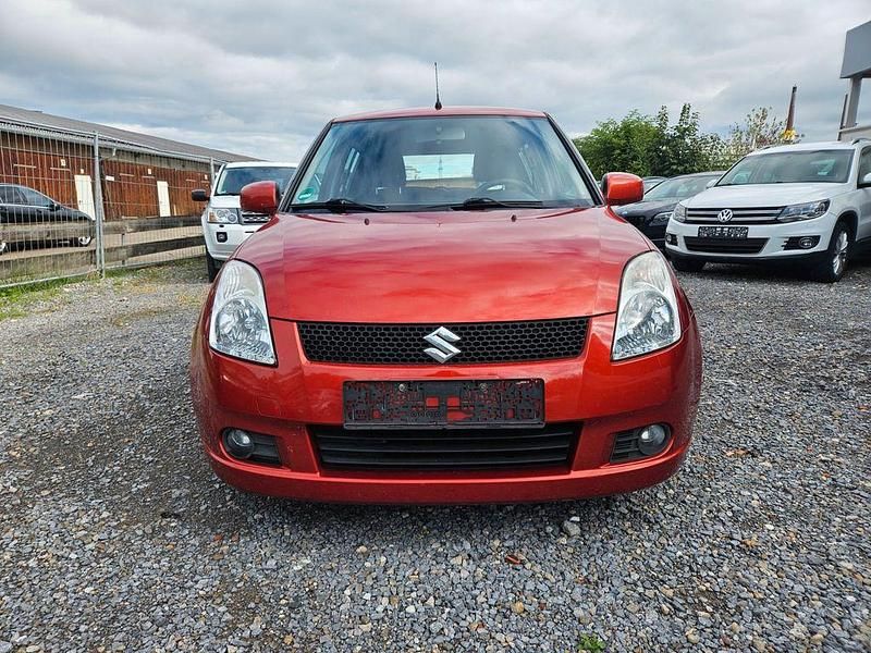 Orange Gebraucht 2006 Suzuki Swift Comfort Limousine | 2.200 € (Fairer Preis) - Bild 1/4