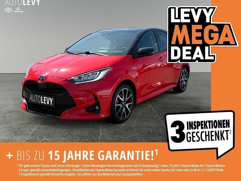 Coral / black mica Gebraucht 2021 Toyota Yaris Hybrid Edition Kleinwagen | 19.990 € (Fairer Preis) - Bild 1/4