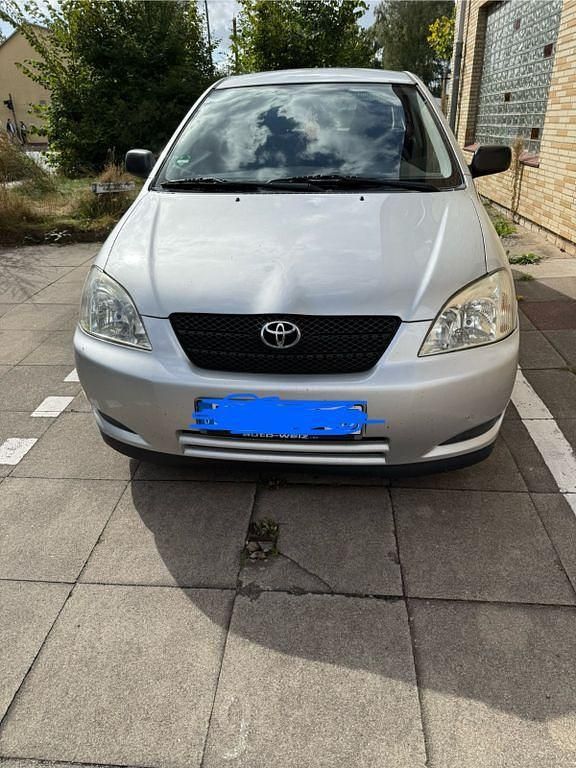 Grau Gebraucht 2002 Toyota Corolla Limousine | 2.500 € (Fairer Preis) - Bild 1/4