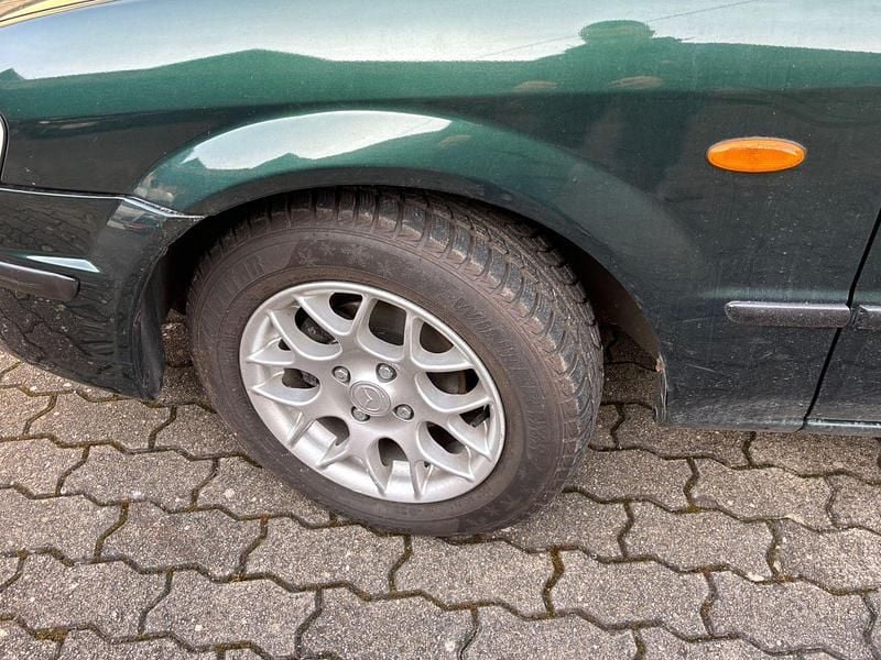 Gebraucht Mazda 323F 73 PS (53 kW) 1998 Grün Kleinwagen