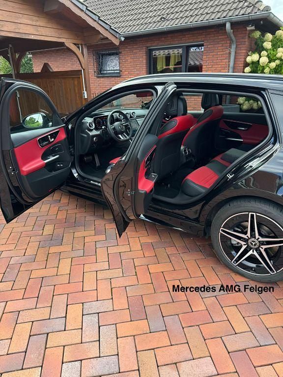 Schwarz Gebraucht 2022 Mercedes C300e AMG line Kombi | 43.900 € (Teuer) - Bild 1/4