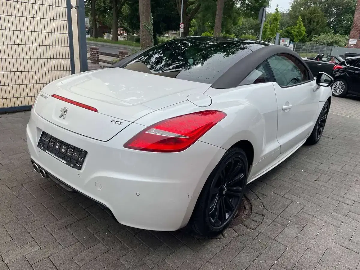 Gebraucht Peugeot RCZ 163 PS (119 kW) 2014 Lack weiss perlglänzend/ Coupé