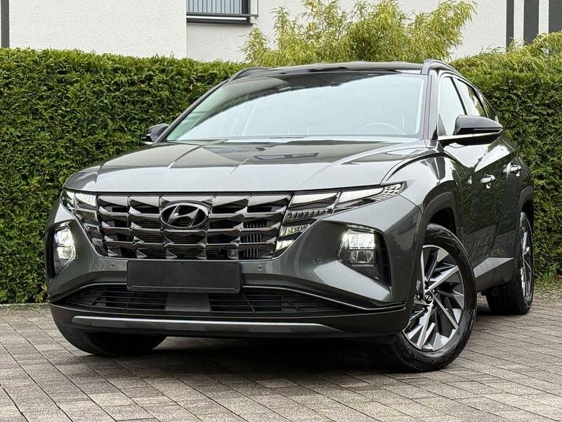 Amazon grey met. dach schwar Gebraucht 2022 Hyundai Tucson Trend SUV | 26.900 € (Guter Preis) - Bild 1/4