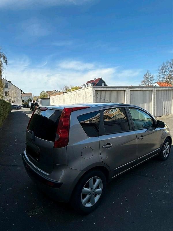Second-hand Nissan Note 110 CP (80 kW) 2007 Auriu Hatchback