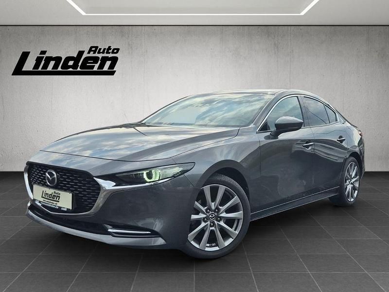 Grau Gebraucht 2019 Mazda 3 Selection Limousine | 20.870 € (Etwas zu teuer) - Bild 1/4