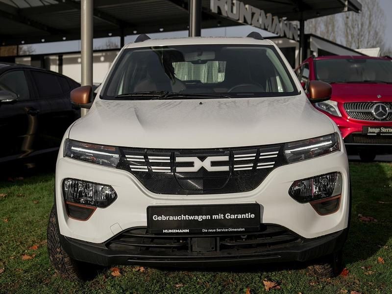 Gebraucht Dacia Spring Extreme 47 kW (65 PS) 2023 Polarweiss Kleinwagen