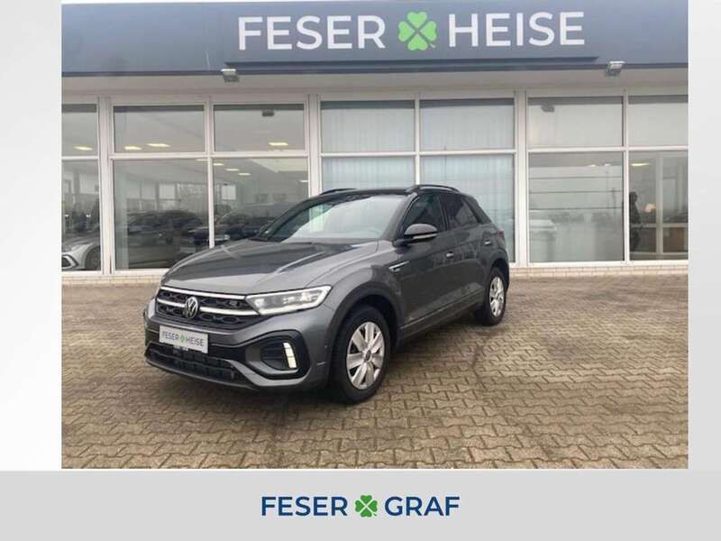 Indiumgrau metallic schwarz Gebraucht 2024 VW T-Roc R-line SUV | 28.450 € (Superpreis) - Bild 1/4
