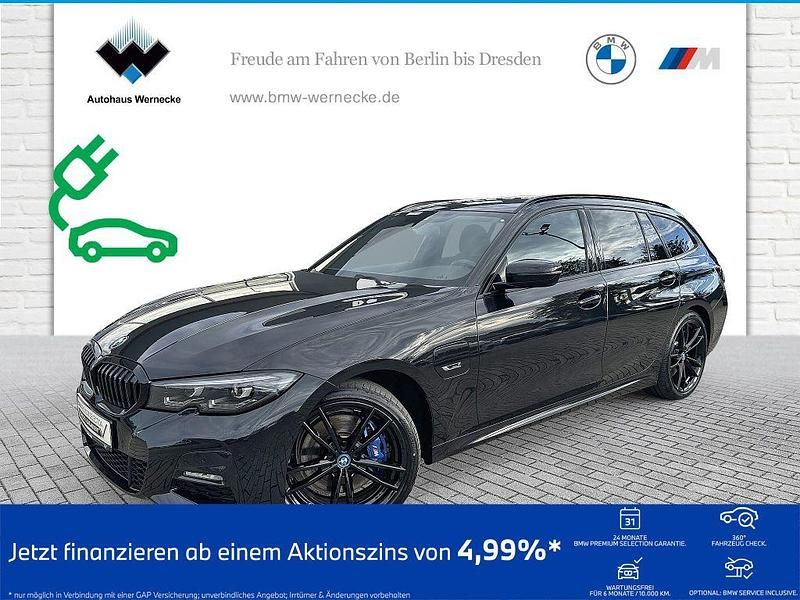 Saphirschwarz Gebraucht 2021 BMW 330e M Sport Kombi | 32.837 € (Fairer Preis) - Bild 1/4
