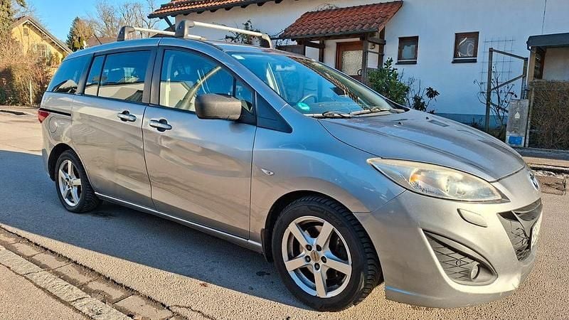 Plutossilber Gebraucht 2011 Mazda 5 Center-Line Van / Kleinbus | 2.450 € (Superpreis) - Bild 1/4