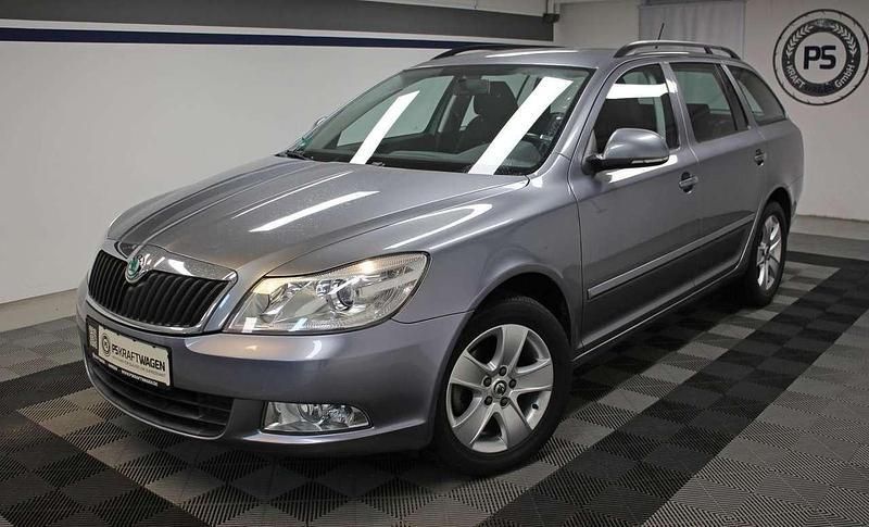 Grau Gebraucht 2012 Skoda Octavia Ambition Kombi | 9.890 € (Guter Preis) - Bild 1/4