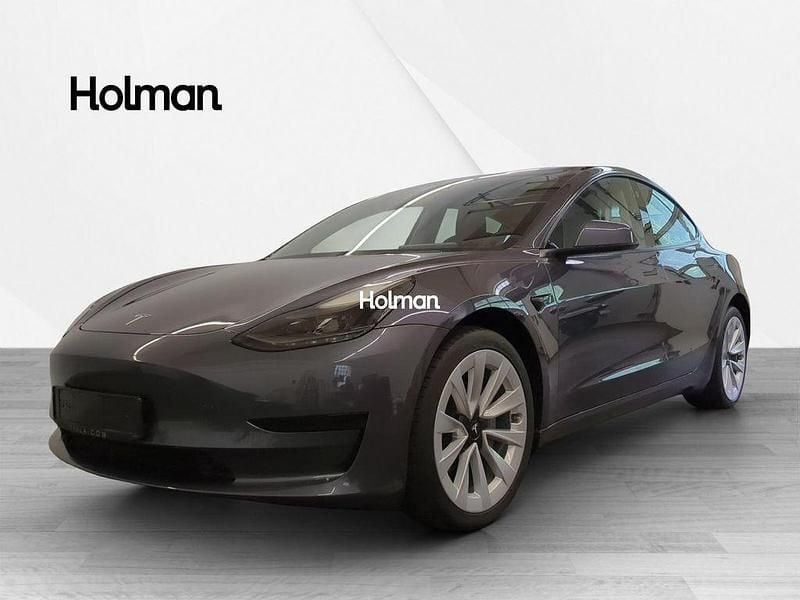 Grau Gebraucht 2021 Tesla Model 3 Standard Range Plus Limousine | 23.469 € (Superpreis) - Bild 1/4