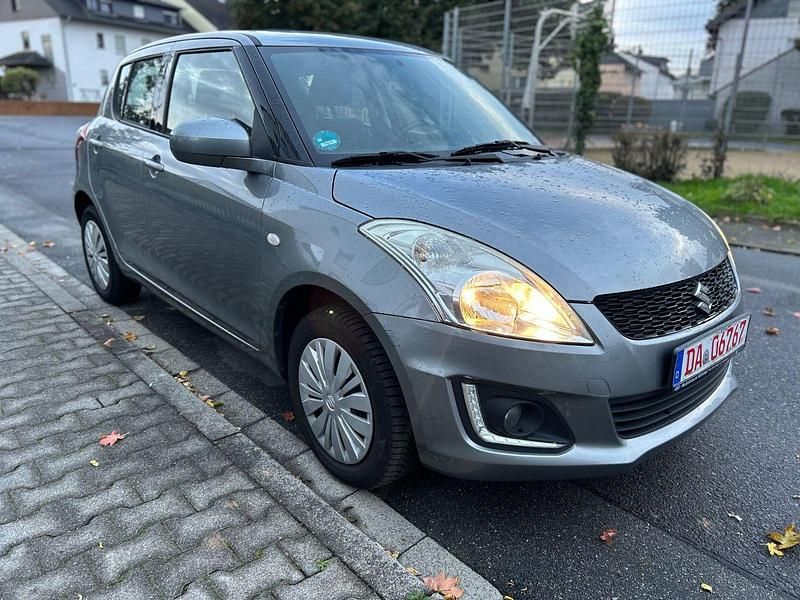 Gebraucht Suzuki Swift Club 94 PS (69 kW) 2015 Grau Kleinwagen