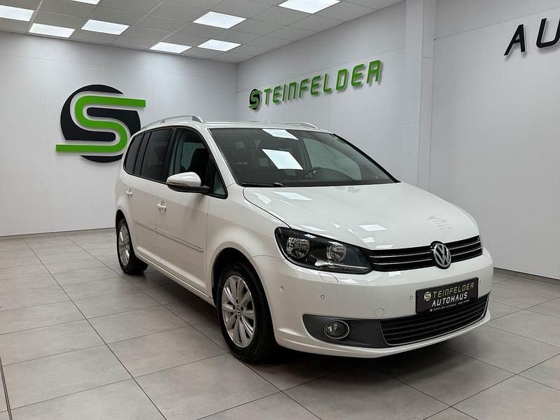 Weiß Gebraucht 2011 VW Touran Highline Van / Kleinbus | 6.990 € (Fairer Preis) - Bild 1/4