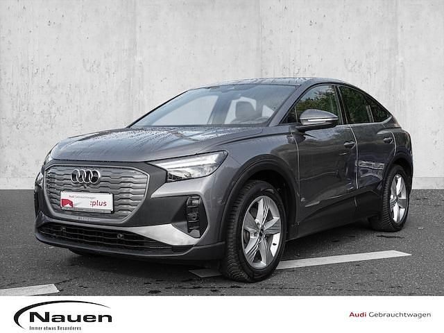 Taifungrau metallic Gebraucht 2022 Audi Q4 Sportback e-tron Ambiente SUV | 27.950 € (Fairer Preis) - Bild 1/3