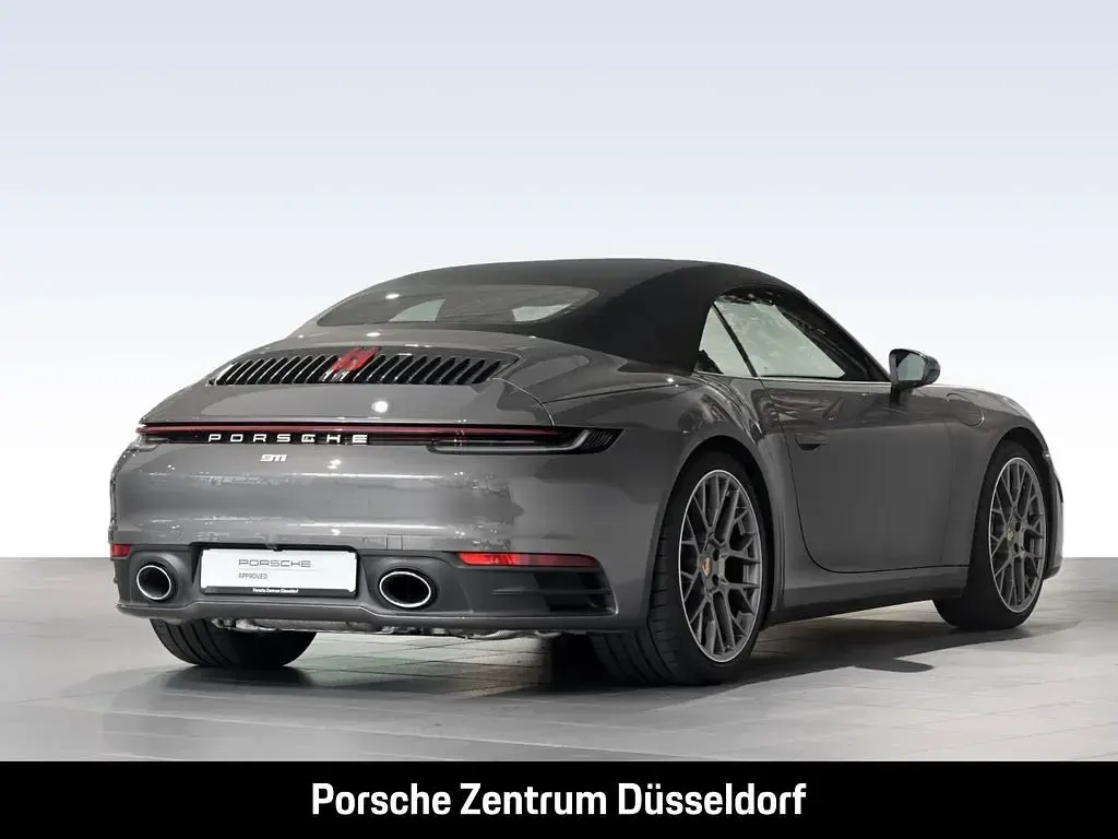 Gebraucht Porsche 911 Carrera Cabriolet 385 PS (283 kW) 2022 Achatgraumetallic Cabrio