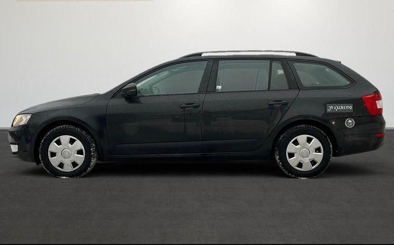 Second-hand Skoda Octavia Active 105 CP (77 kW) 2013 Negru Break
