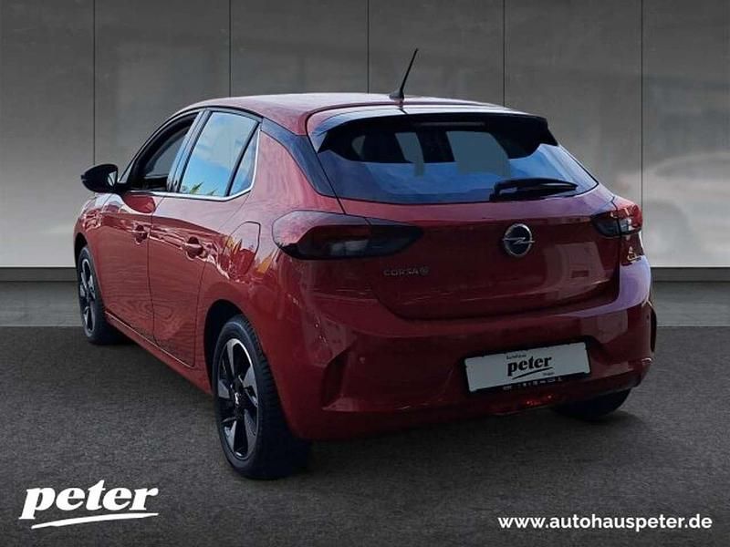 Gebraucht Opel Corsa-e Elegance 100 kW (136 PS) 2023 Lackierung peperoncino red/typ Kleinwagen