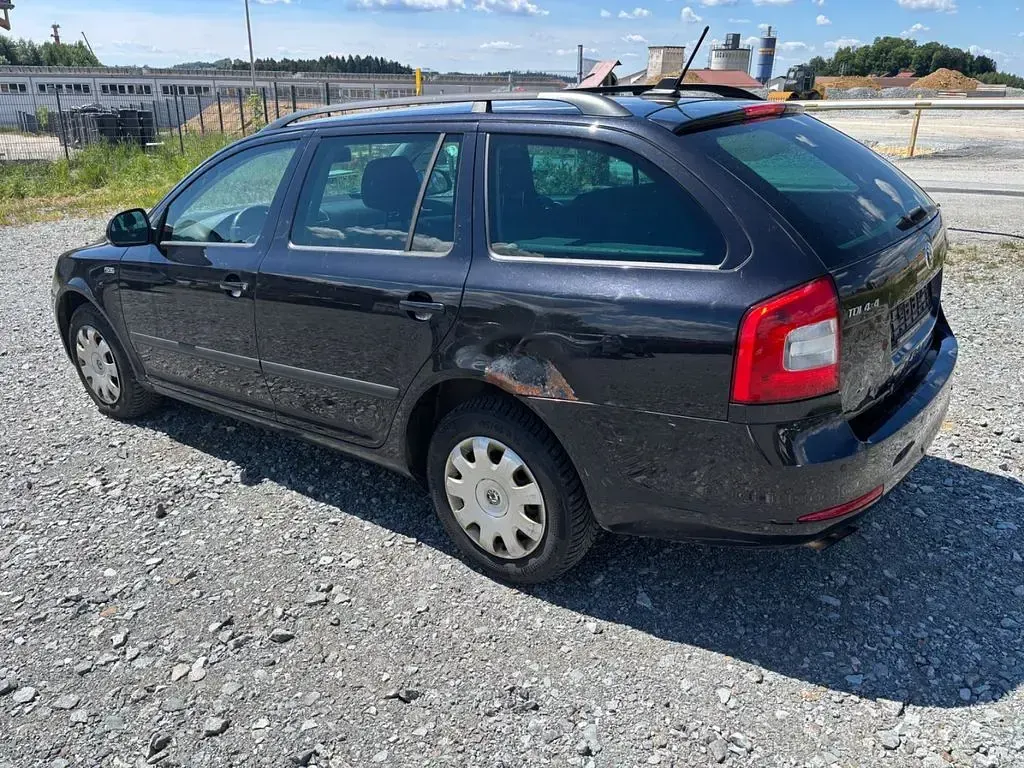 Brugt Skoda Octavia 105 HK (77 kW) 2012 Sort Stationcar