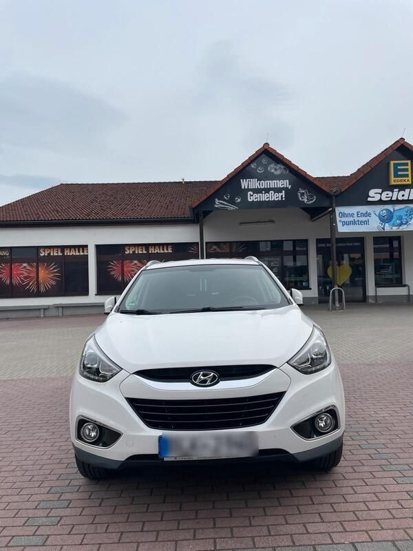 Weiß Gebraucht 2013 Hyundai Tucson SUV | 14.500 € - Bild 1/4
