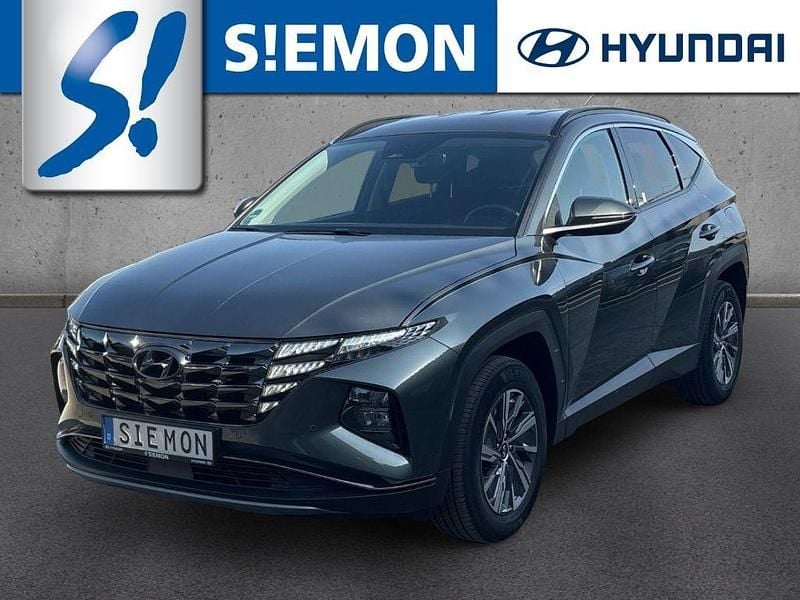 Grau Gebraucht 2021 Hyundai Tucson Trend SUV | 24.530 € (Guter Preis) - Bild 1/4