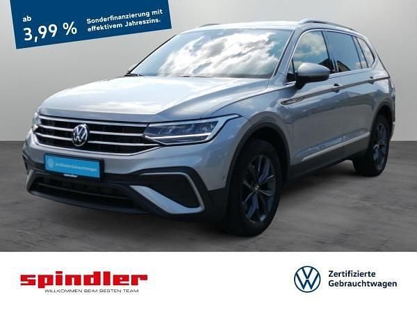 Silber (pyritsilber metallic) Gebraucht 2023 VW Tiguan Allspace Move SUV | 36.941 € (Guter Preis) - Bild 1/3