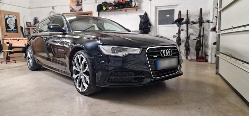 Używany Audi A6 Ambiente 245 KM (180 kW) 2014 Czarny Kombi